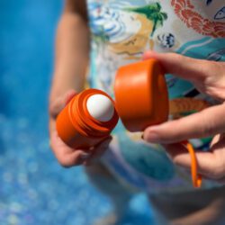 Solmates-Desert-Orange-50ml-Refillable-Roll-On-Applicator-held-in-hands